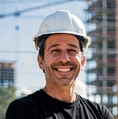 Professional construction expert wearing safety helmet at job site in Los Angeles